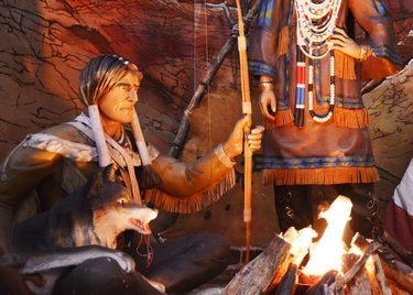 Indian Hunter Sitting Down. Wth. Bow &amp| Dog