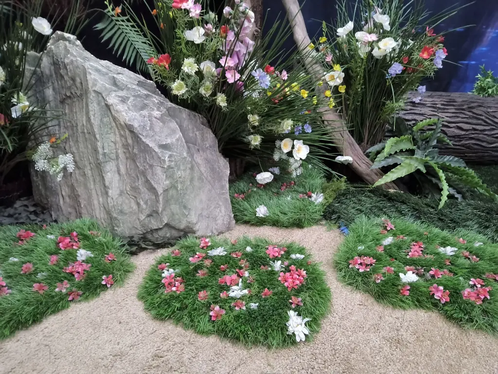 Three Patches of Grass with Flowers