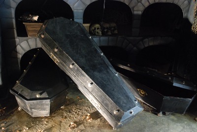 Coffin, Black, with Ironwork