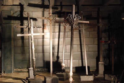 Tomb, Iron Cross, on rock/column