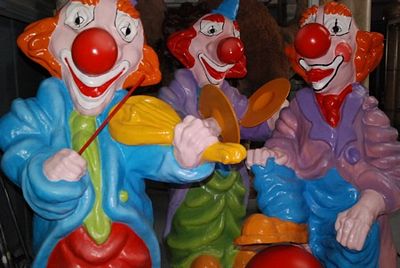 Clown,  the  Fiddler, musician, clown with foot on ball