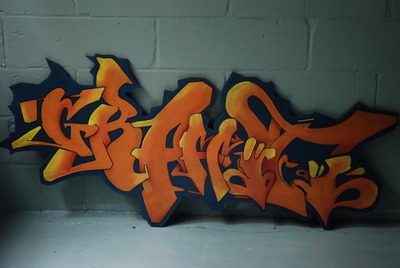 Panel with the text  " GRAFFITI "