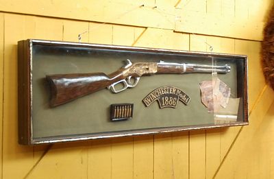 Showcase  with a  Winchester