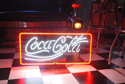 Neon  " Coca-Cola"  in frame 220v