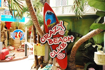 Panel ""Crazy Beach Club"" on surfboard