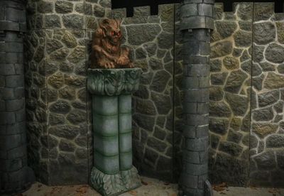 Devilish Figure on a double Column