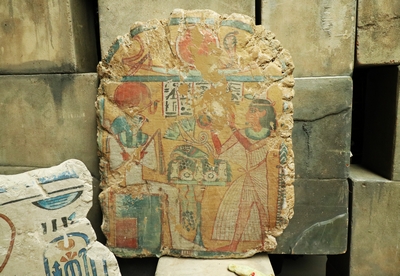 Stone Slab   a Priest worshiping the god Ra