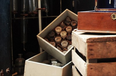 20 small Pharmacy Bottles in White Crate
